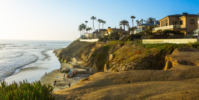 Beautiful Carlsbad landscape and community featuring gates and garage doors